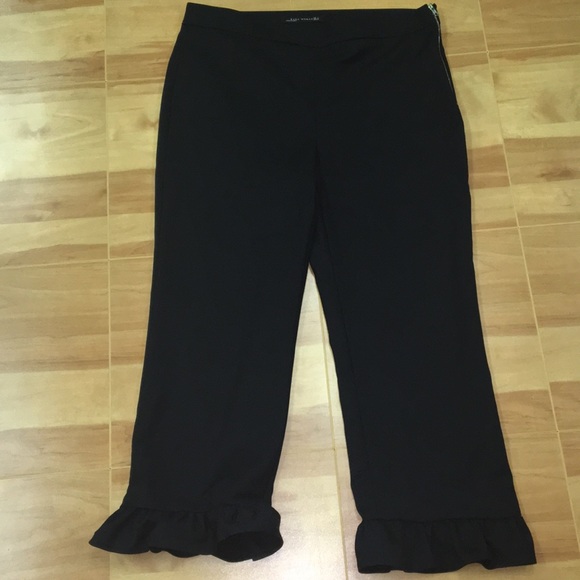 black jeans with ruffle bottom